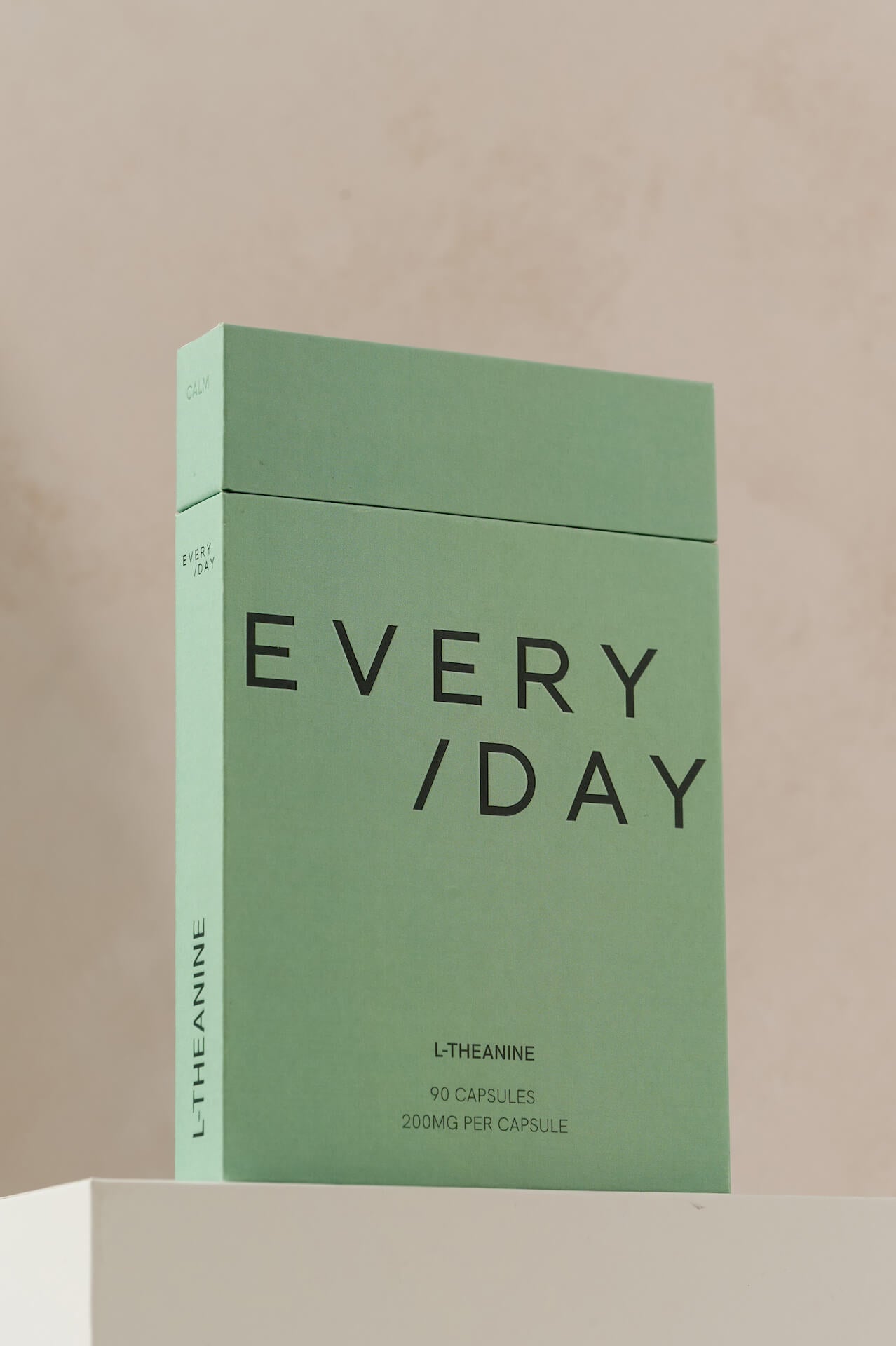 Eco-friendly sage green box containing 90 capsules of 200mg L-Theanine by Everyday Supplements, designed for daily cognitive support in minimalist, plastic-free & sustainable packaging.